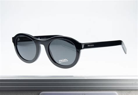 how to spot fake prada sunglasses|prada sunglasses old models.